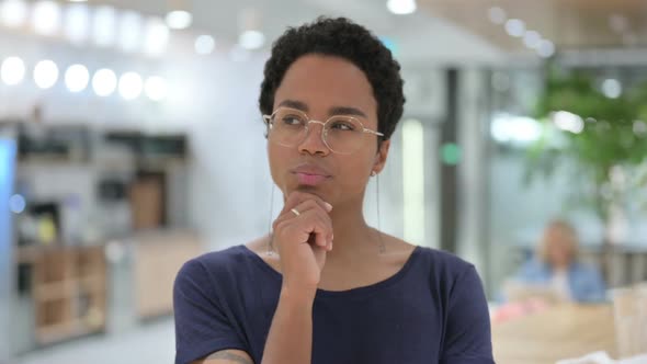 Portrait of Casual African Woman Thinking About Something