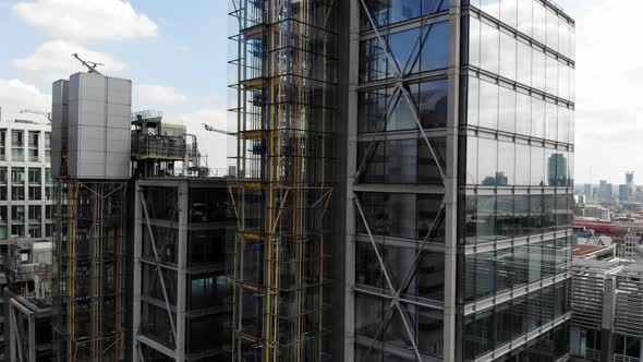 Raising up revealing the Walkie Talkie and the Shard building in London on a sunny day