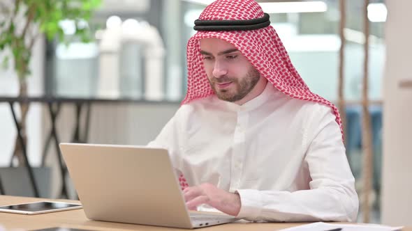 Positive Arab Businessman Showing Thumbs Up Sign