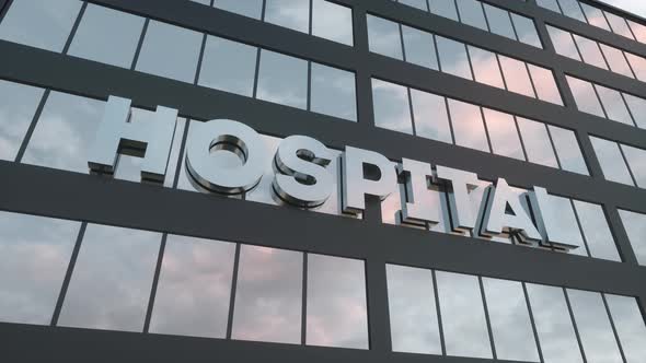 Hospital Sign on a Modern Glass Skyscraper