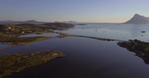 Aerial, Beautiful View On Pond And A Breathtaking Landscape By The Sea With Tavolara Island