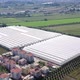 Greenhouses in field. Aerial view. - VideoHive Item for Sale