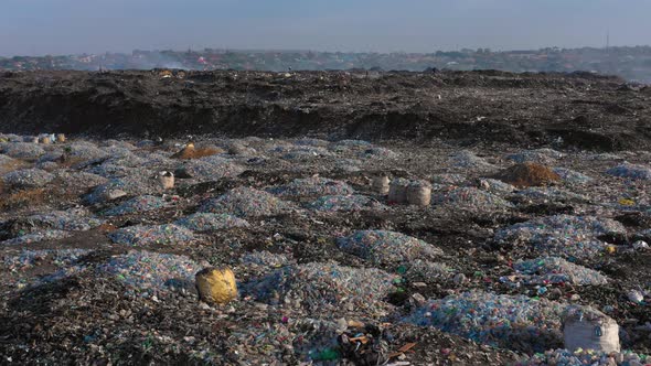 Piles of plastic garbage in a landfill. Lusaka, Zambia. 4K