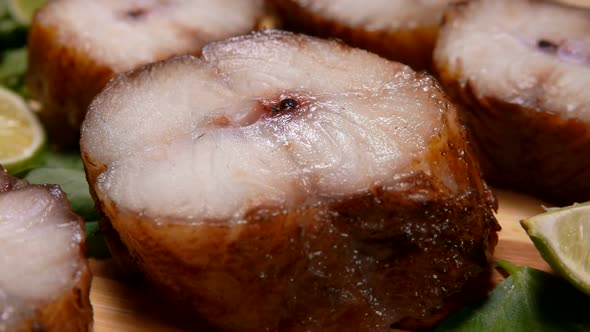 Close-up Camera Movement in Pieces of Smoked Eel