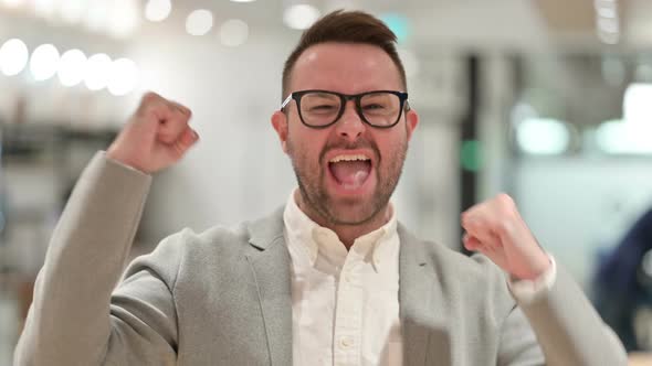 Excited Creative Man Celebrating Success