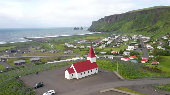 Church in Vik, Iceland with drone video moving over.