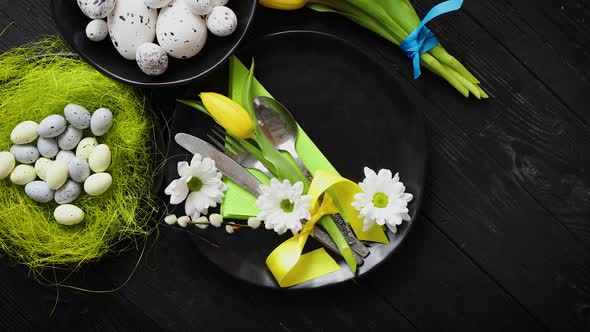 Easter Spring Table Dishware Composition with Yellow Tulip Flower