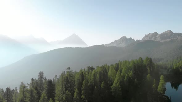 Aerial Flying over Mountain Forest at Croda da Lago in Dolomites Alps Italy