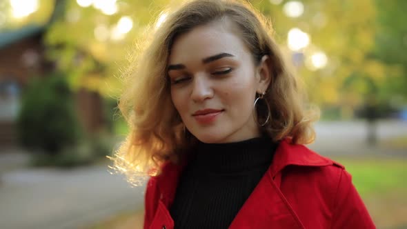 Beautiful Woman Portrait at the Fall Day