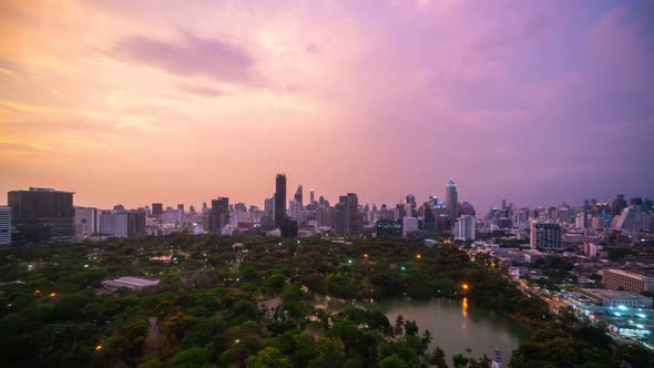 Day and night transition time lapse of cityscape and buildings in metropolis