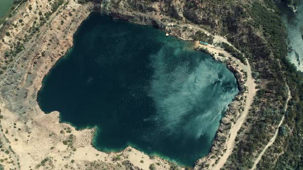 Aerial View of Wind Gusts on the Surface of a Dark Radon Lake