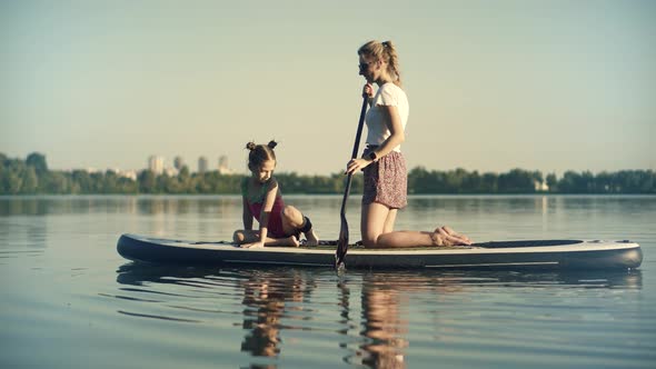 Stand Up Paddle Boarding Family Girl. Mothers Day. Travel Paddles Paddleboard Daughter.