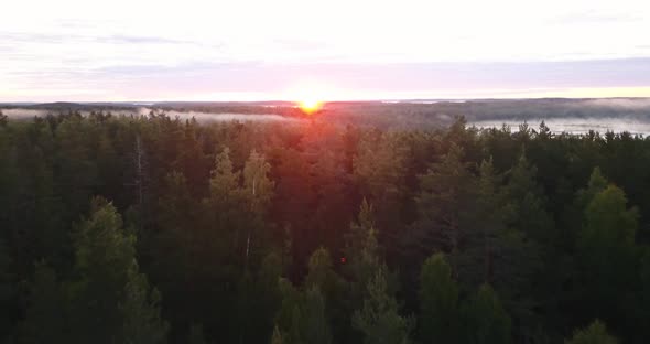 An aerial shot of sunrise in finland