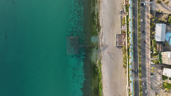 Traffic on the beach aerial view 4 K