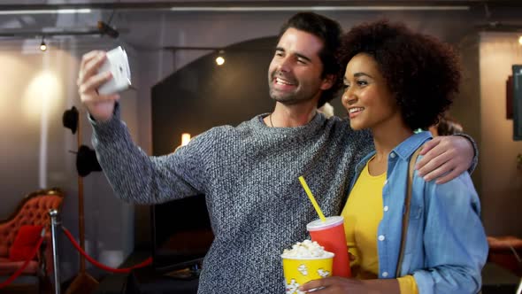 Couple taking selfie with mobile phone 4k