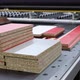 Particle Boards are Stacked on a Woodcutting Machine - VideoHive Item for Sale
