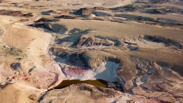 Vertical Pan to Reveal Arid Desert Landscape