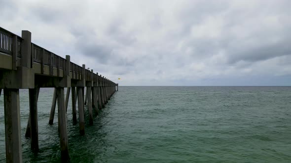 Wooden Pier in Atlantic Ocean in Pensacola, Florida - Epic Aerial Drone Shot