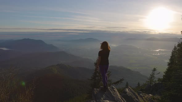 Adventurous Caucasian Adult Woman Hiking in Canadian Nature