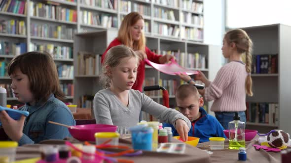 Kids with Special Needs Playing Slimes in Library