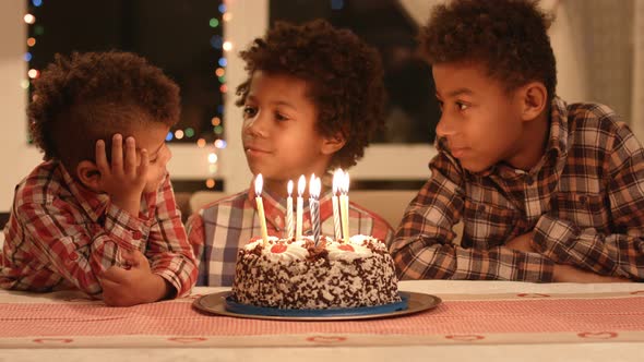 Afro Boys and Birthday Cake.