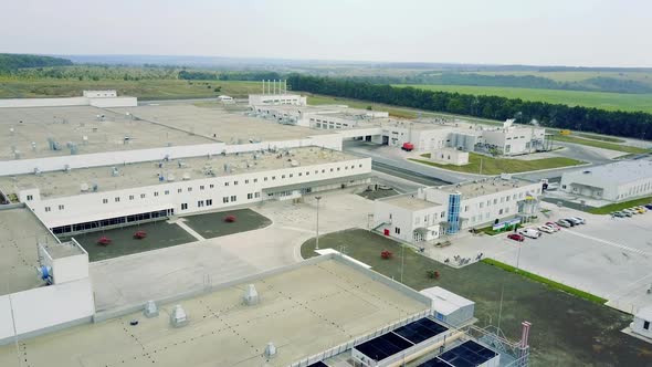 Modern Factory Exterior. Aerial view of newly constructed distribution center