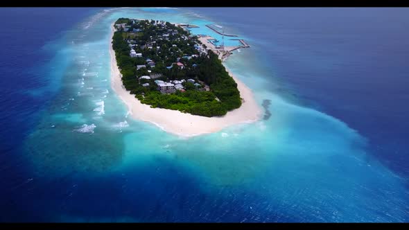 Aerial drone tourism of idyllic resort beach adventure by blue water with clean sandy background of 