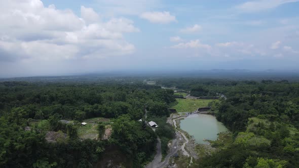 River with protective dams system by sand mine near Mount Merapi, Indonesia