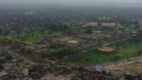 Lahore, Pakistan, Drone view of world famous Badshahi Mosque and Lal Qillla with huge view of city, 