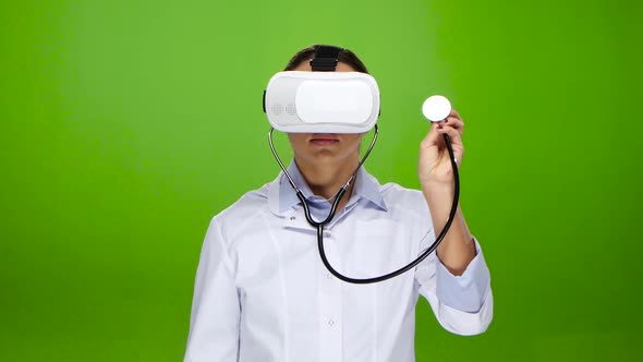 Woman Doctor Studies with the Help of Virtual Reality Glasses