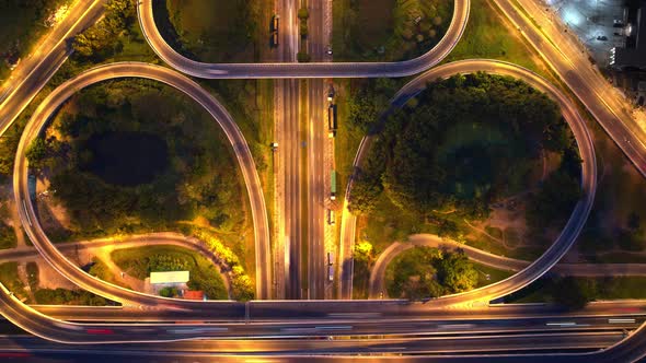 4K : Aerial Hyper lapse drone view of road junction with moving cars. alt