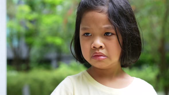 Portrait of Asian angry, sad and cry little girl, The emotion of a child when tantrum and mad, expre