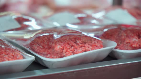 Raw Minced Meat Closeup on the Shelves of a Hypermarket