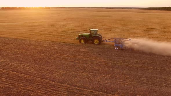 Tractor Plowing Field.