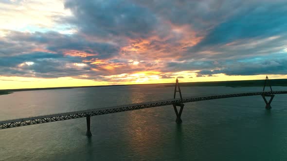 Aerial view flying over the Deh Cho Bridge at sunset, near Fort Providence Northwest Territories - M