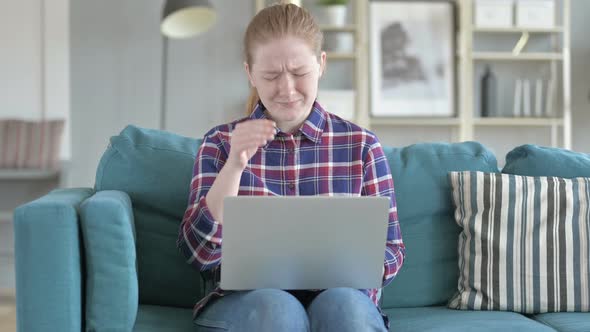 Young Woman Working on Laptop And Having Headache