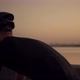 Cyclist Rider In Helmet And Sportswear Riding Workout At Sunset On Triathlon Time Trial Bicycle. - VideoHive Item for Sale