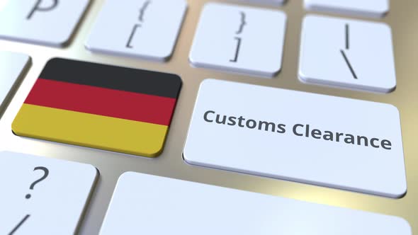 CUSTOMS CLEARANCE Text and Flag of Gemany on Keyboard