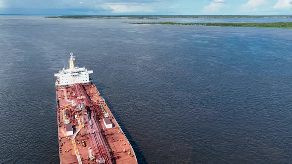 Freight ship sailing at Amazon River Manaus Brazil. Transportation.