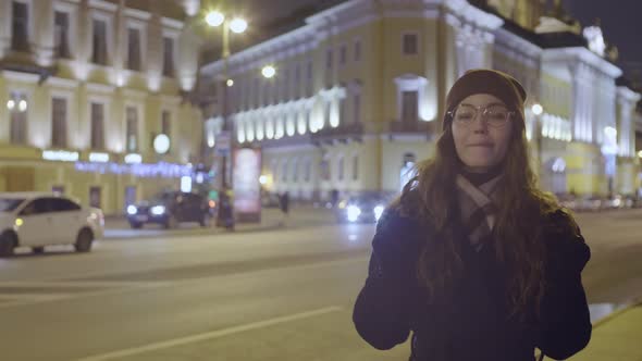 Pretty Curly-haired Woman Walking