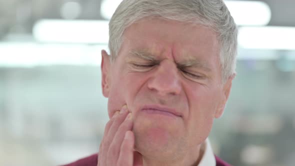 Close Up of Middle Aged Man with Toothache, Pain