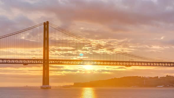 Lisbon City Sunrise with April 25 Bridge Night To Day Timelapse