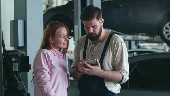 Female Client Speaking with Technician alt