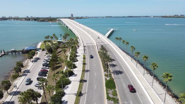 Beautiful ariel of the John Ringling Causeway in Sarasota, Florida.  Tourist love the palm line stre