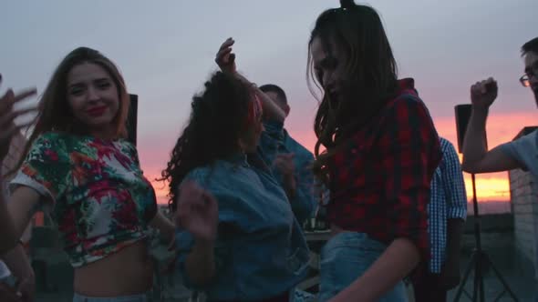 Sexy Girls Dancing at Rooftop Party