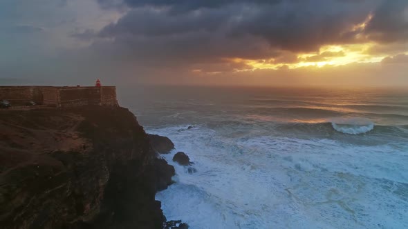 Aerial View of Lighthouse and Big Waves Portugal