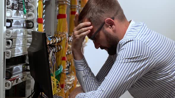 Engineer Working in Data Room