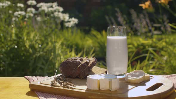 Glass of milk bread and cheese