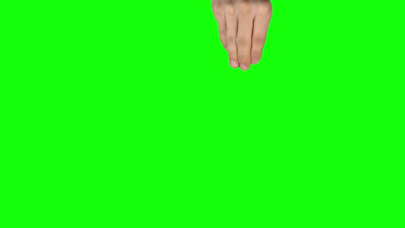 Man Hand Is Performing 5x Pinch at Tablet Screen Gesture on Green Screen. Close Up