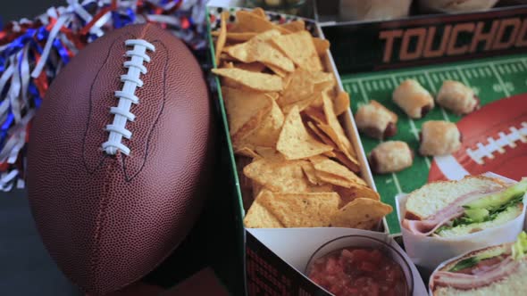 Football Snack Stadium filled with sub sandwiches, veggies and chips.